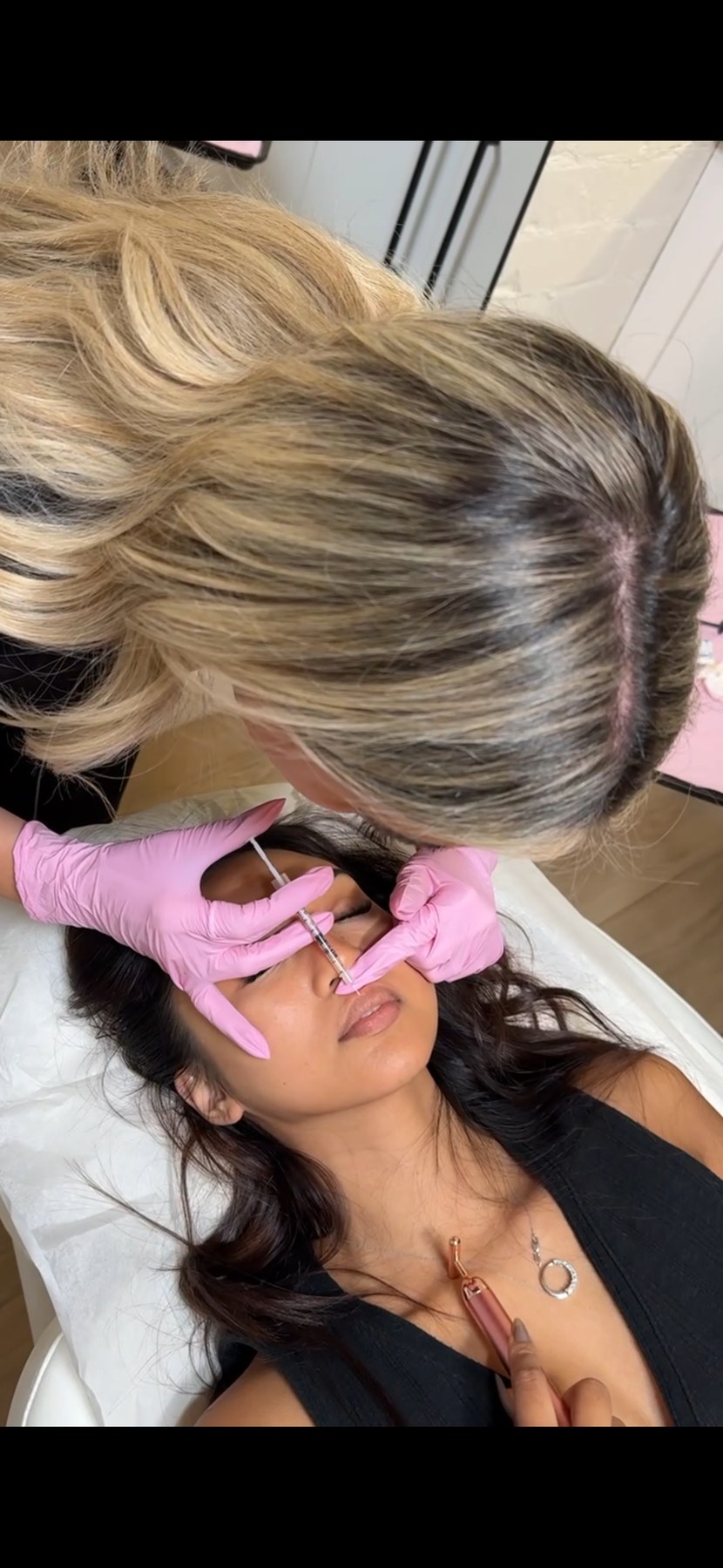 LYEV provider administering a facial injectable treatment