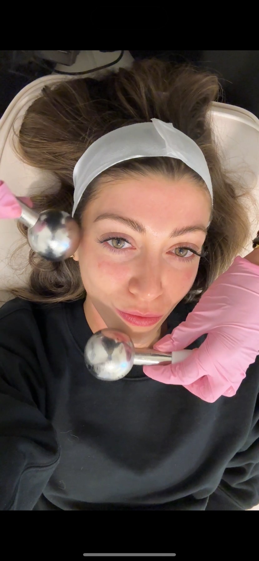LYEV provider performing a handheld facial skincare treatment