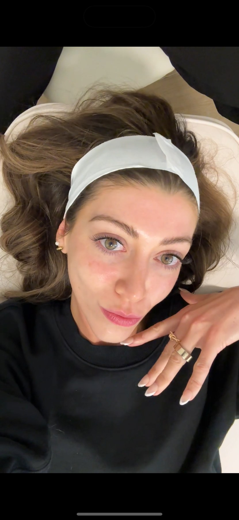 Guest resting after a skincare treatment at LYEV